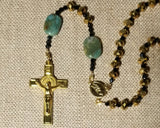 Rosary with green stones for the Pater, Gold glass Crystals for the Hail Marys,  for Holy family, Holy Spirit